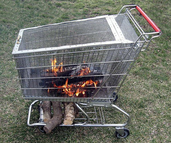 Portable Fire Pit with Built in Log Storage Rack. 