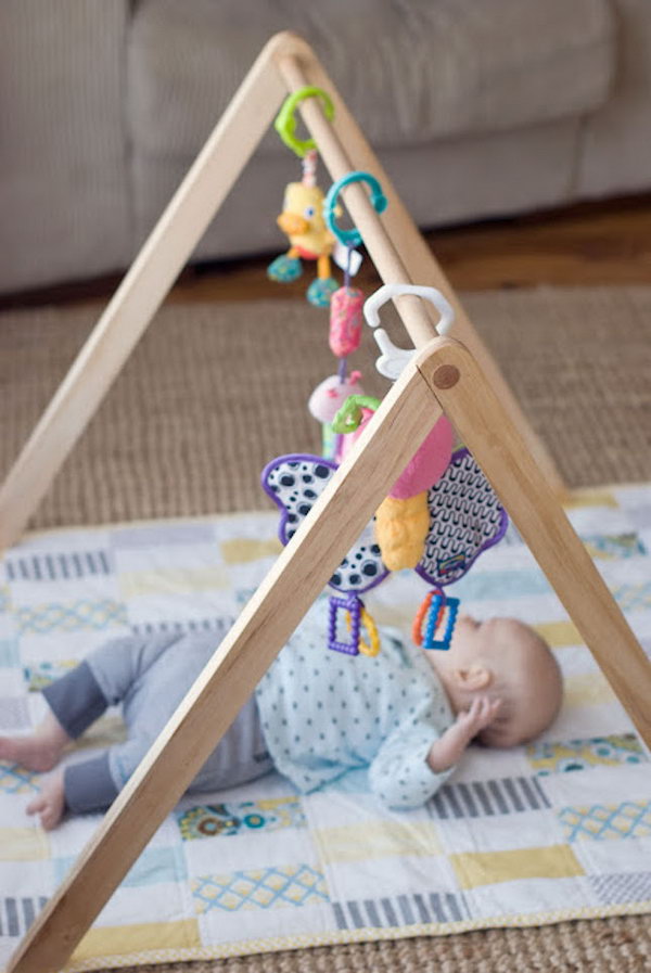 DIY Wooden Baby Gym. Get the tutorial 