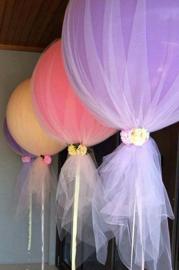 Tulle Wrapped over Balloons Tied with Ribbon and Flowers. Tutorial. 