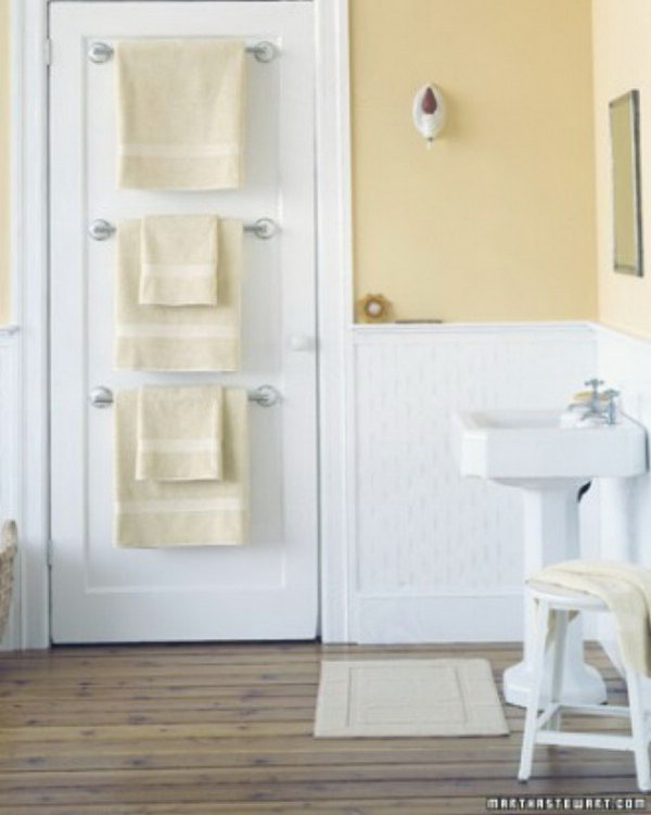 Hang Towel Holders Behind Bathroom Door For More Storage Space
