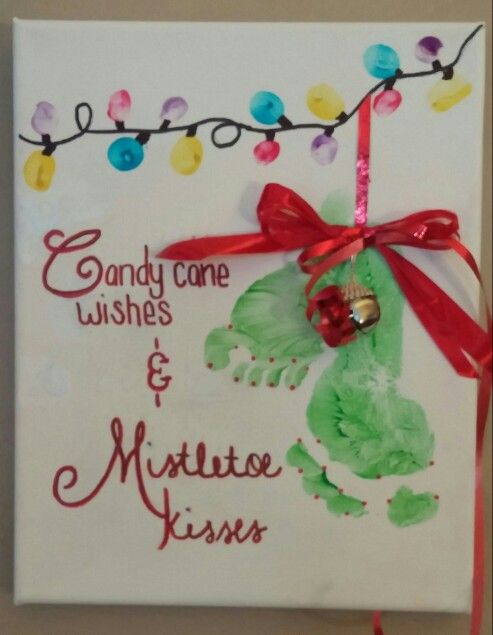 Christmas Canvas Using Footprints for Ornaments and Thumbprints for Lights. 
