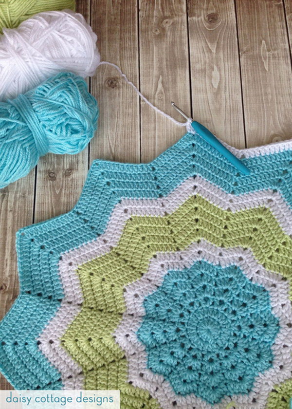 Turquoise and Lime Crochet Star Baby Blanket. 