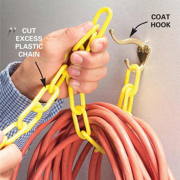 Store Your Garden Hose with Chains and a Coat Hook. 
