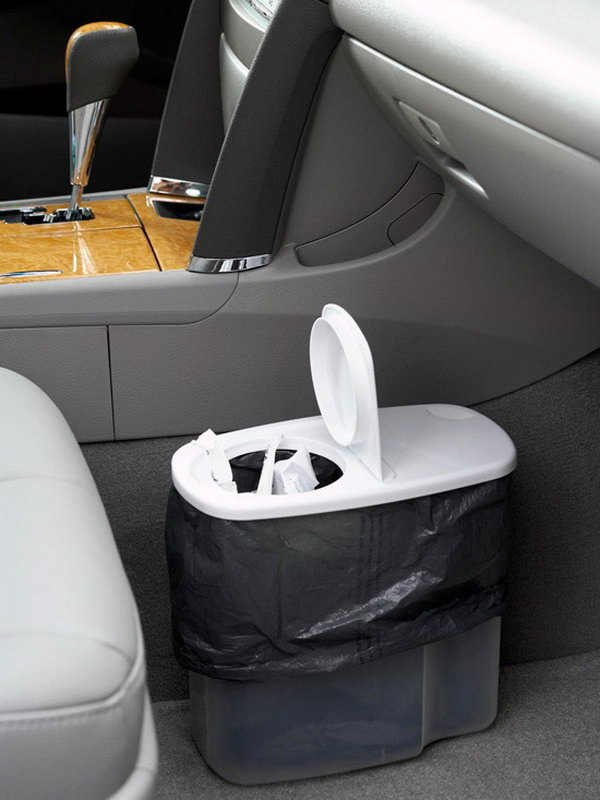 Convert a plastic cereal dispenser into a trash receptacle for your car. 
