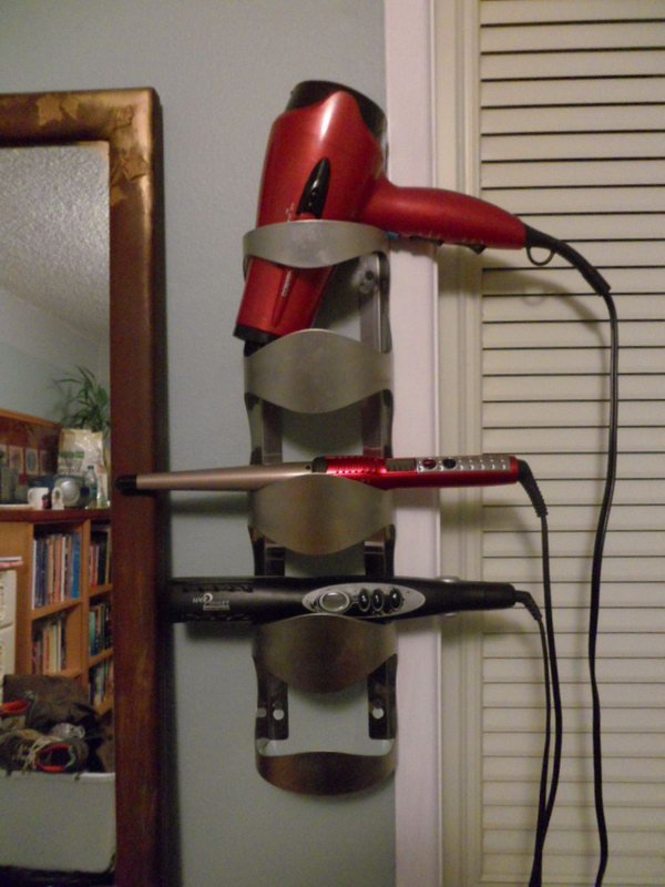 Turn your old wine bottle holder into a useful hot tools storage