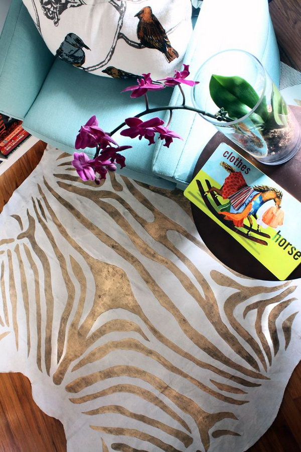 Painted Gold Zebra Rug on a Drop Cloth. 