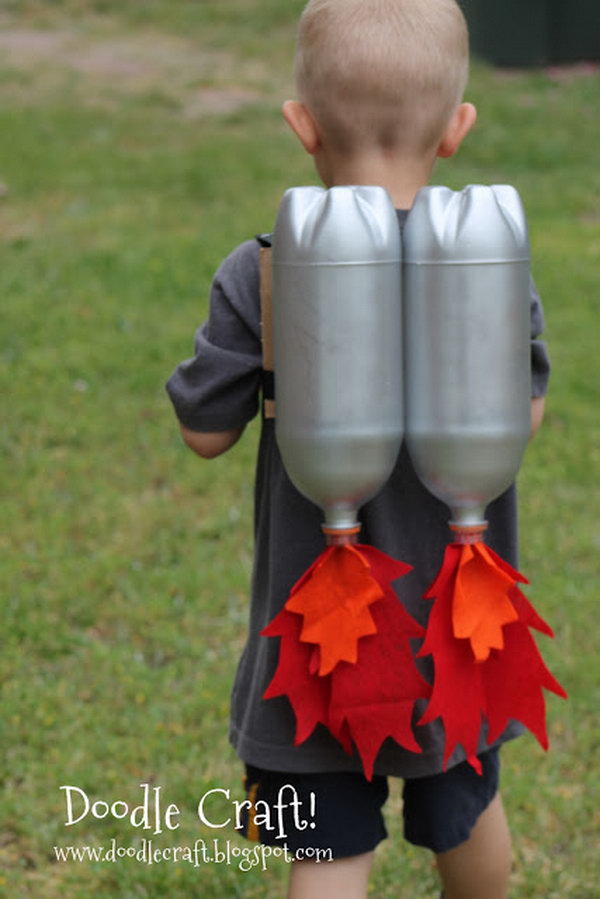 DIY Jet Pack with Soda Bottles. Make a jet pack out of spray-painted bottles and red and orange fabric. Great for outerspace play! Tutorial via  