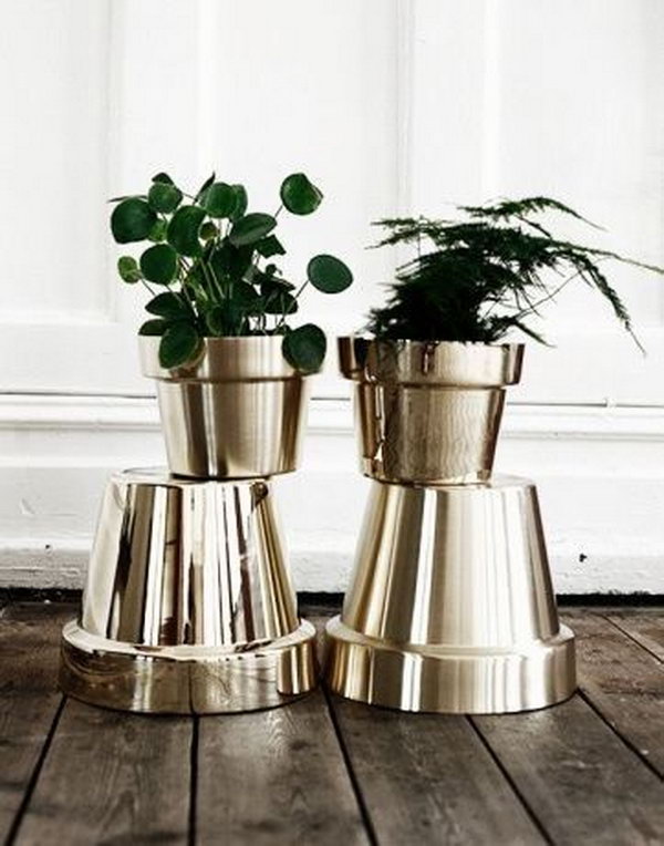 Spray Paint Your Terracotta Pots Metallic Colors to Get an Expensive Look. See details 