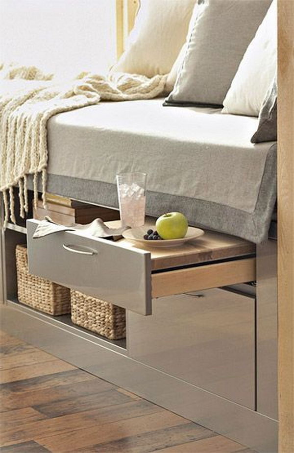 A Bed Incorporates Storage Units and a Pull Out Shelf-table. 