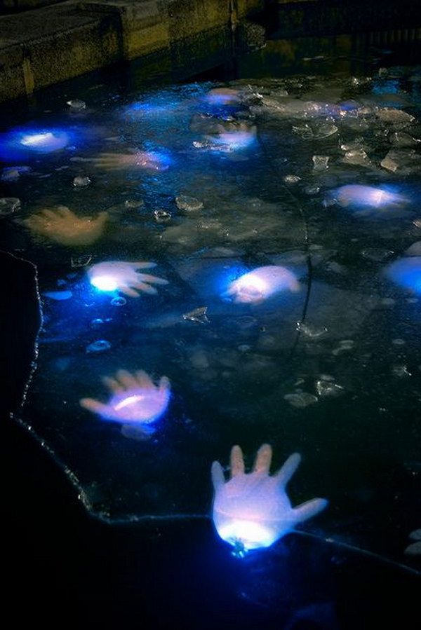 Creepy Pond Idea Using Latex Gloves with Glow Sticks. 